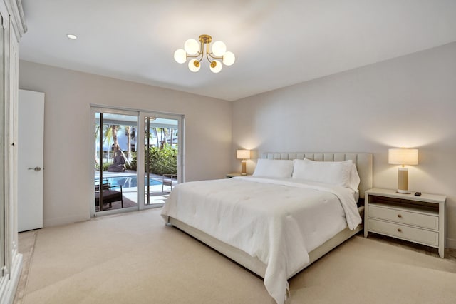 bedroom featuring an inviting chandelier, light carpet, baseboards, and access to outside