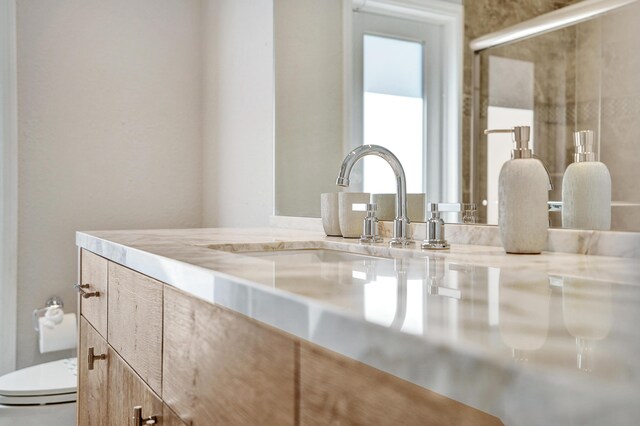 details with toilet and vanity