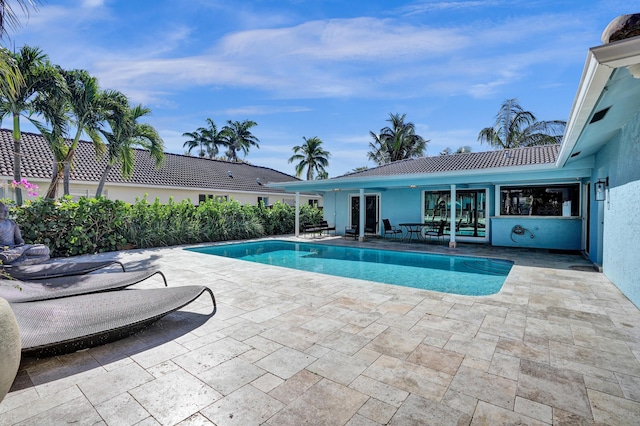 pool with a patio