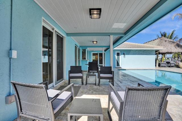 view of patio / terrace featuring an outdoor pool