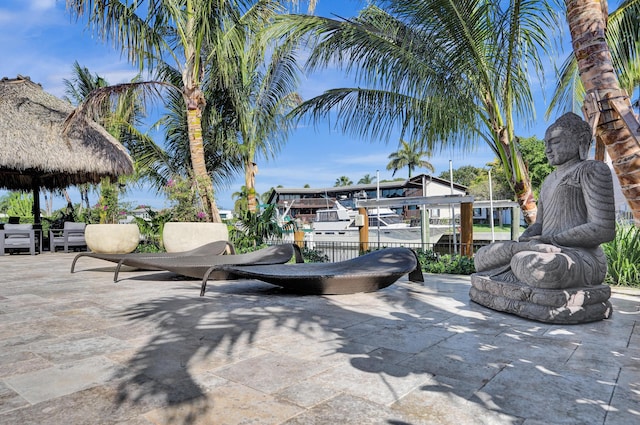 view of patio featuring fence