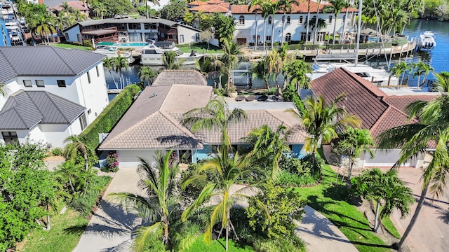 aerial view with a residential view and a water view