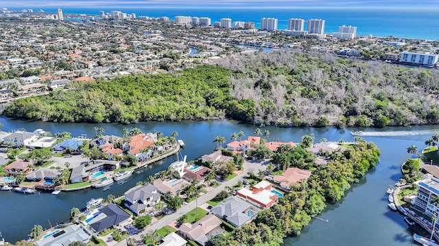 bird's eye view with a residential view and a water view