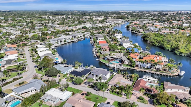 aerial view featuring a water view and a residential view