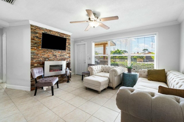 living area with ceiling fan, a textured ceiling, light tile patterned floors, and ornamental molding