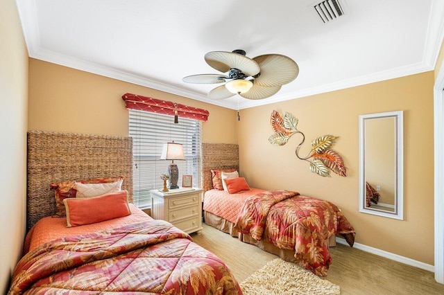 bedroom with a ceiling fan, ornamental molding, baseboards, and visible vents