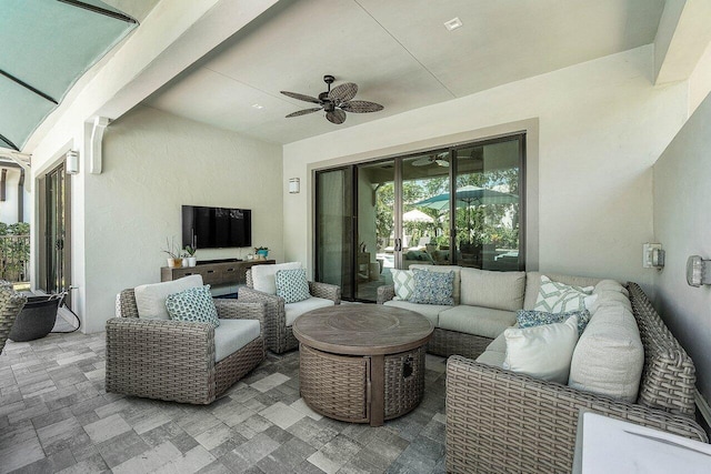 view of patio featuring an outdoor hangout area and ceiling fan