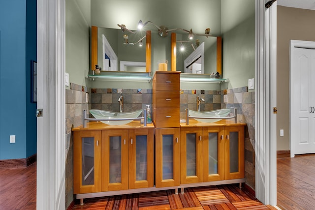 17888 Fieldbrook Cir W, Boca Raton, FL 33496 - bathroom featuring tile walls, a wainscoted wall, wood finished floors, and double vanity