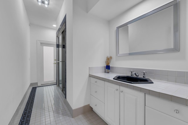 17888 Fieldbrook Cir W, Boca Raton, FL 33496 - bathroom with baseboards, tile patterned floors, vanity, and a shower with shower door
