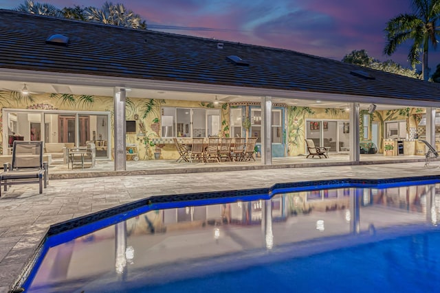17888 Fieldbrook Cir W, Boca Raton, FL 33496 - pool at dusk with a patio area and an outdoor pool