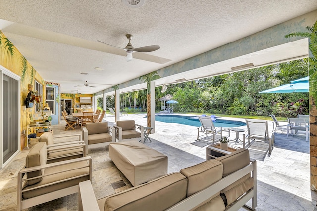 17888 Fieldbrook Cir W, Boca Raton, FL 33496 - view of patio / terrace featuring an outdoor hangout area, outdoor dining space, a ceiling fan, and an outdoor pool