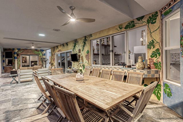 17888 Fieldbrook Cir W, Boca Raton, FL 33496 - dining room with wallpapered walls, a ceiling fan, and light stone finish flooring