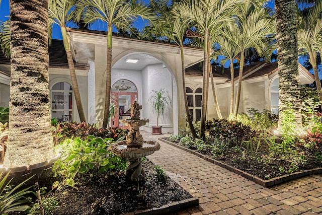 17888 Fieldbrook Cir W, Boca Raton, FL 33496 - doorway to property with stucco siding