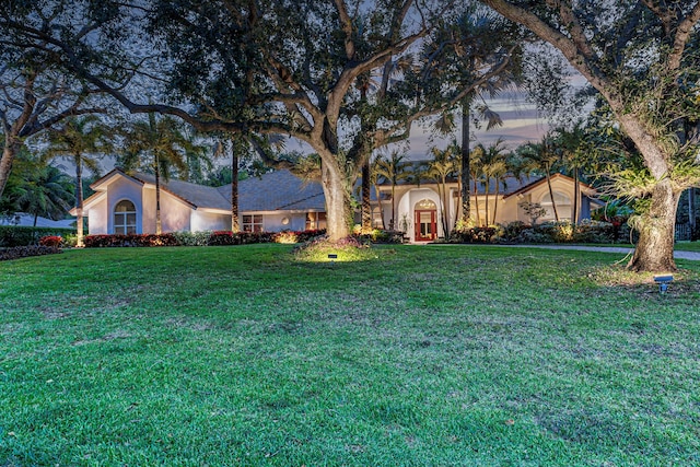17888 Fieldbrook Cir W, Boca Raton, FL 33496 - view of front of house featuring stucco siding and a front lawn