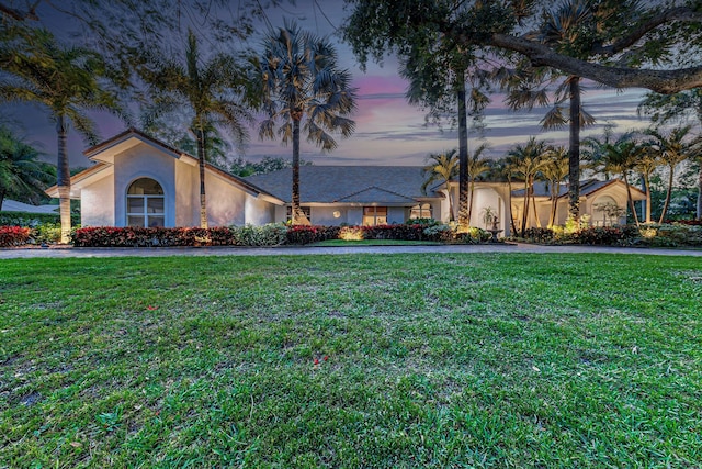 17888 Fieldbrook Cir W, Boca Raton, FL 33496 - view of front of home with stucco siding and a front lawn