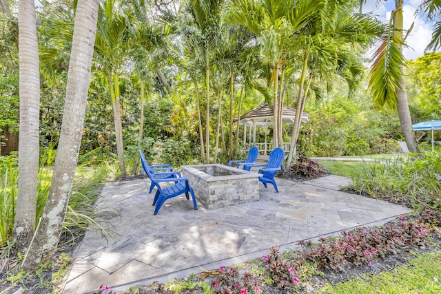 17888 Fieldbrook Cir W, Boca Raton, FL 33496 - view of patio / terrace featuring a gazebo and a fire pit