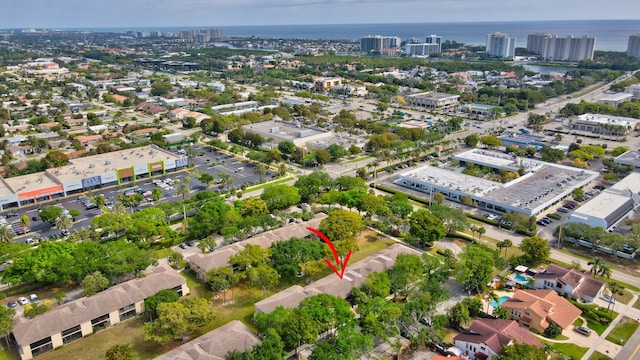 aerial view with a city view and a water view