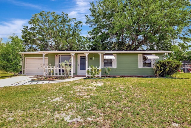 775 Sandia Ave, Port Saint Lucie, FL 34983 - single story home featuring an attached garage, driveway, and a front lawn