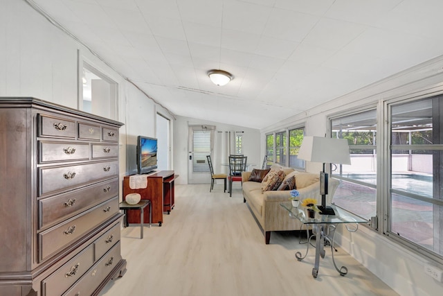 775 Sandia Ave, Port Saint Lucie, FL 34983 - living area with vaulted ceiling and light wood-style floors