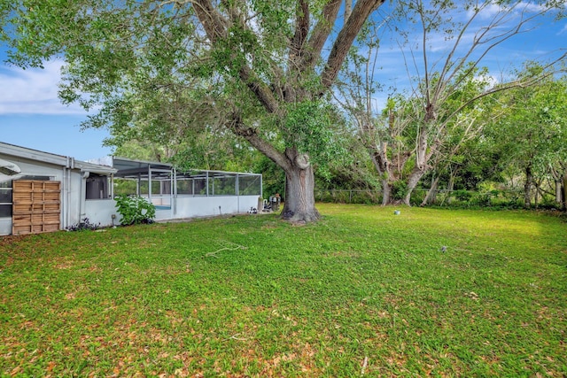775 Sandia Ave, Port Saint Lucie, FL 34983 - view of yard with fence and a sunroom