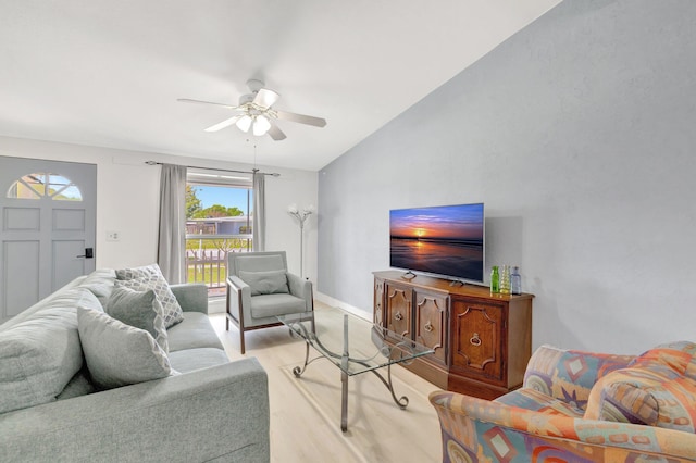 775 Sandia Ave, Port Saint Lucie, FL 34983 - living area featuring light wood-style floors, baseboards, a ceiling fan, and vaulted ceiling