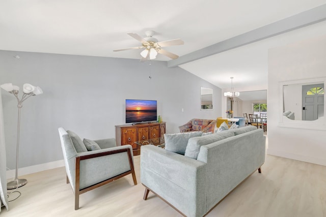 775 Sandia Ave, Port Saint Lucie, FL 34983 - living area featuring light wood-style floors, ceiling fan, baseboards, and lofted ceiling with beams