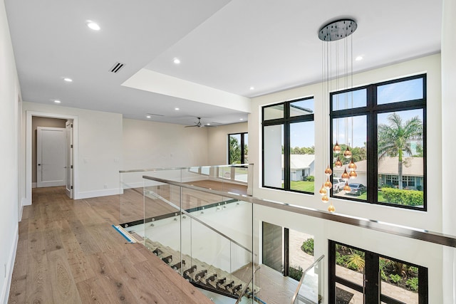 368 Churchill Rd, West Palm Beach, FL 33405 - hall featuring wood finished floors, recessed lighting, visible vents, and baseboards