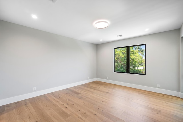 368 Churchill Rd, West Palm Beach, FL 33405 - unfurnished room with recessed lighting, visible vents, baseboards, and light wood finished floors