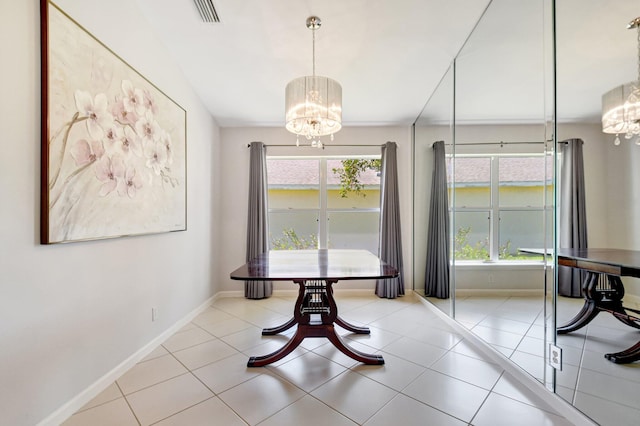 1744 Sawgrass Cir, Greenacres, FL 33413 - dining room featuring baseboards, visible vents, an inviting chandelier, and light tile patterned floors