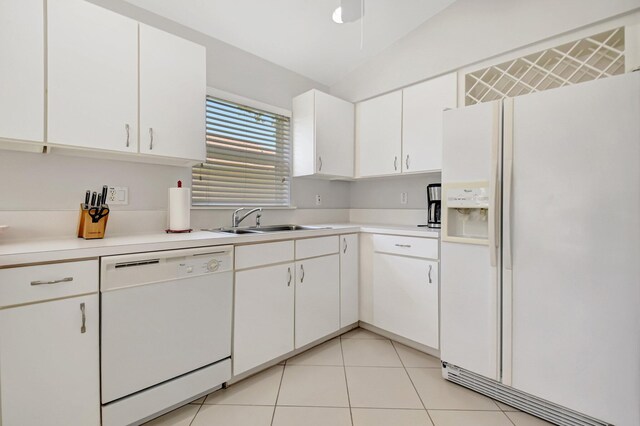 1744 Sawgrass Cir, Greenacres, FL 33413 - kitchen with white cabinetry, light countertops, white appliances, light tile patterned floors, and a sink