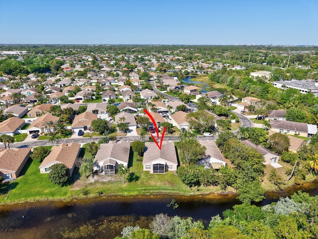 1744 Sawgrass Cir, Greenacres, FL 33413 - aerial view featuring a water view and a residential view