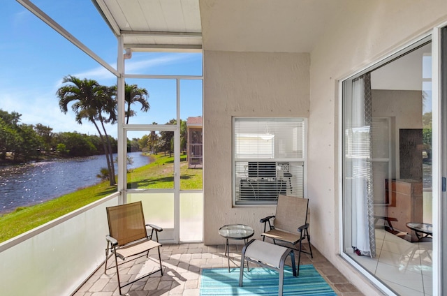1744 Sawgrass Cir, Greenacres, FL 33413 - sunroom / solarium featuring a water view