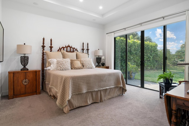 carpeted bedroom with access to outside and recessed lighting
