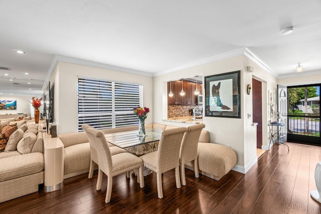 9 Stratford Dr Unit D, Boynton Beach, FL 33436 - dining space featuring recessed lighting, baseboards, dark wood finished floors, and ornamental molding