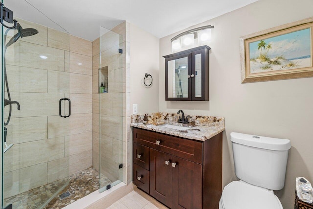 9 Stratford Dr Unit D, Boynton Beach, FL 33436 - bathroom with a shower stall, toilet, and vanity