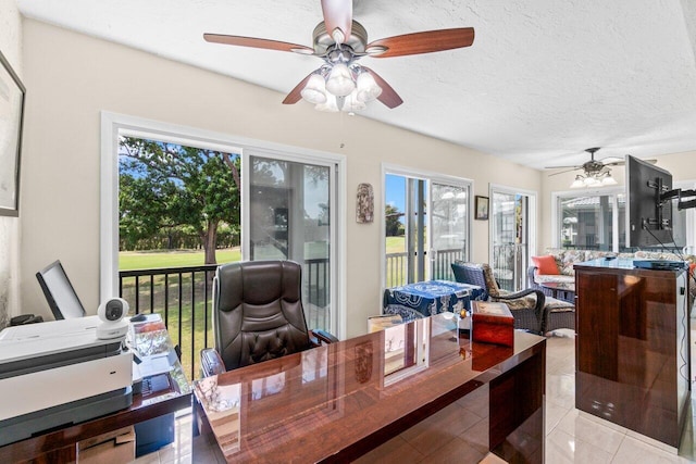 9 Stratford Dr Unit D, Boynton Beach, FL 33436 - office space featuring light tile patterned floors, a textured ceiling, and ceiling fan