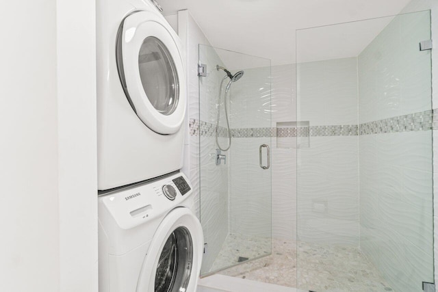 9 Stratford Dr Unit D, Boynton Beach, FL 33436 - laundry area with stacked washer and clothes dryer and laundry area