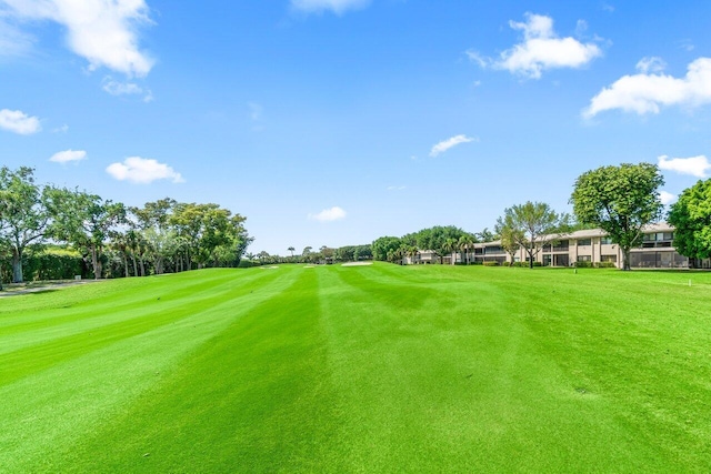 9 Stratford Dr Unit D, Boynton Beach, FL 33436 - view of community featuring a yard