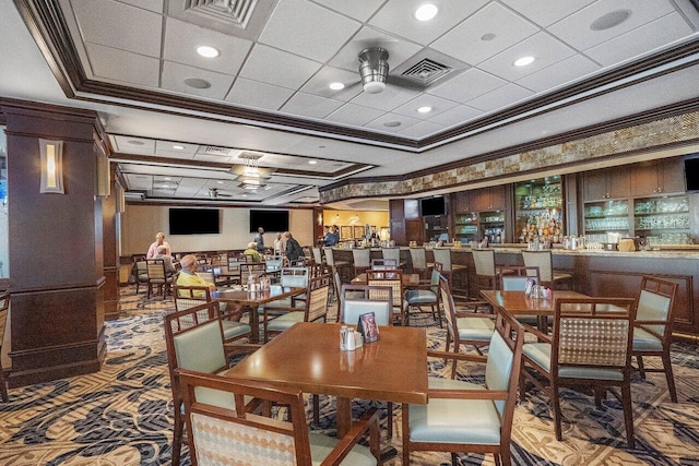 9 Stratford Dr Unit D, Boynton Beach, FL 33436 - dining room featuring crown molding and visible vents