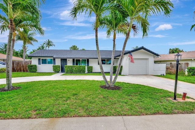 12938 Ellison Wilson Rd, North Palm Beach, FL 33408 - ranch-style house with driveway, stucco siding, a tile roof, and a garage
