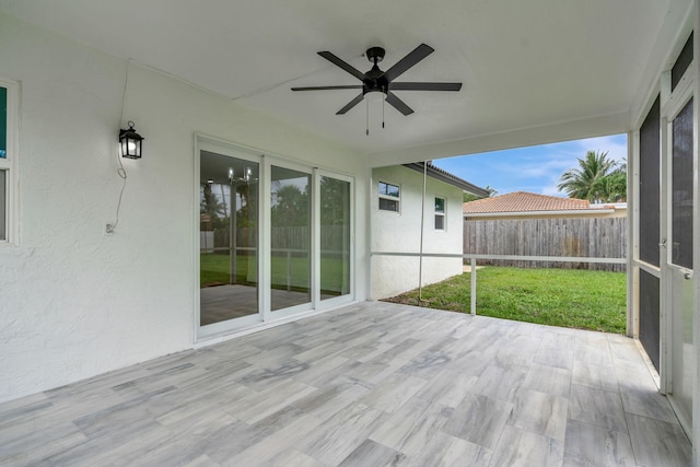 12938 Ellison Wilson Rd, North Palm Beach, FL 33408 - unfurnished sunroom with a ceiling fan