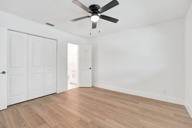 12938 Ellison Wilson Rd, North Palm Beach, FL 33408 - unfurnished bedroom with baseboards, light wood finished floors, a closet, and ceiling fan
