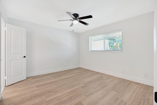 12938 Ellison Wilson Rd, North Palm Beach, FL 33408 - empty room featuring light wood-style flooring, ceiling fan, and baseboards