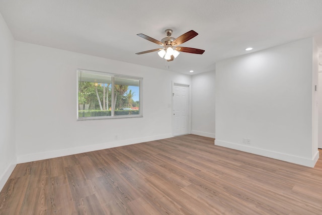 12938 Ellison Wilson Rd, North Palm Beach, FL 33408 - unfurnished room with a ceiling fan, light wood-style flooring, baseboards, and recessed lighting