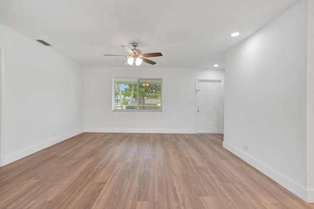 12938 Ellison Wilson Rd, North Palm Beach, FL 33408 - unfurnished room featuring a ceiling fan, baseboards, recessed lighting, and light wood-style flooring