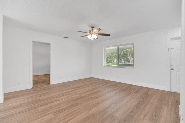 12938 Ellison Wilson Rd, North Palm Beach, FL 33408 - unfurnished room featuring ceiling fan, light wood finished floors, and baseboards