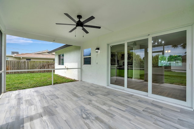 12938 Ellison Wilson Rd, North Palm Beach, FL 33408 - wooden deck with ceiling fan and a patio area
