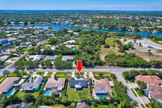 12938 Ellison Wilson Rd, North Palm Beach, FL 33408 - aerial overview of property's location with nearby suburban area and a nearby body of water