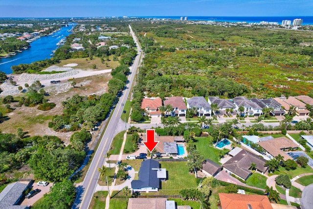 12938 Ellison Wilson Rd, North Palm Beach, FL 33408 - aerial view of property's location with a nearby body of water and nearby suburban area