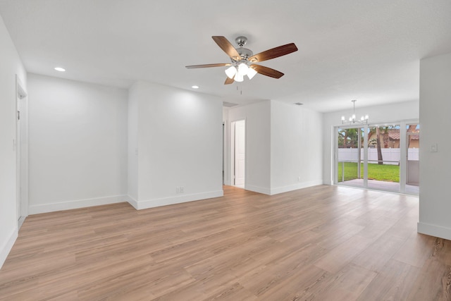 12938 Ellison Wilson Rd, North Palm Beach, FL 33408 - unfurnished room featuring a chandelier, ceiling fan, baseboards, recessed lighting, and light wood finished floors